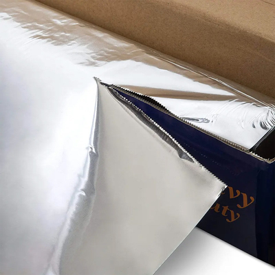 Rollo resistente adicional de plata del papel de aluminio del hogar con el cortador del diente de sierra de la banda